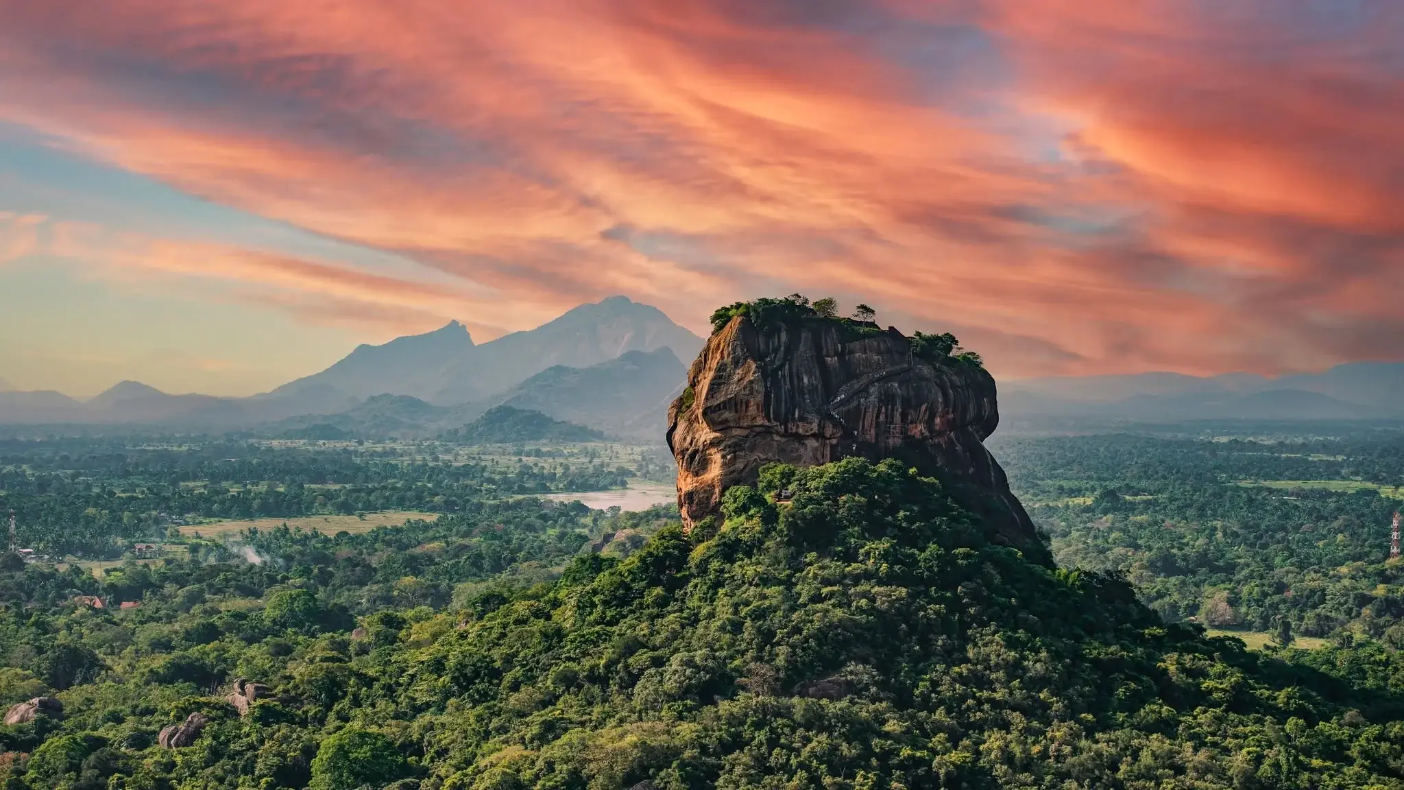 Sigiriya rock fortress rising above Sri Lanka's green central plains